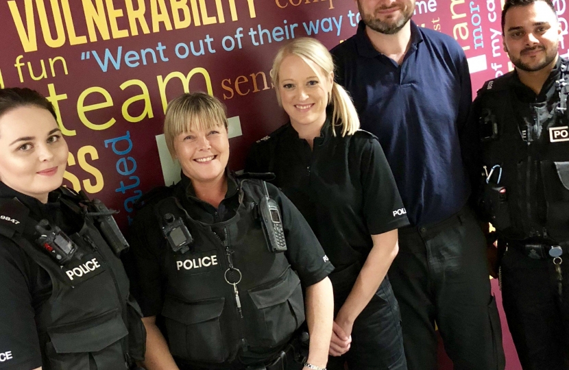 Andrew Stephenson MP with local police officers