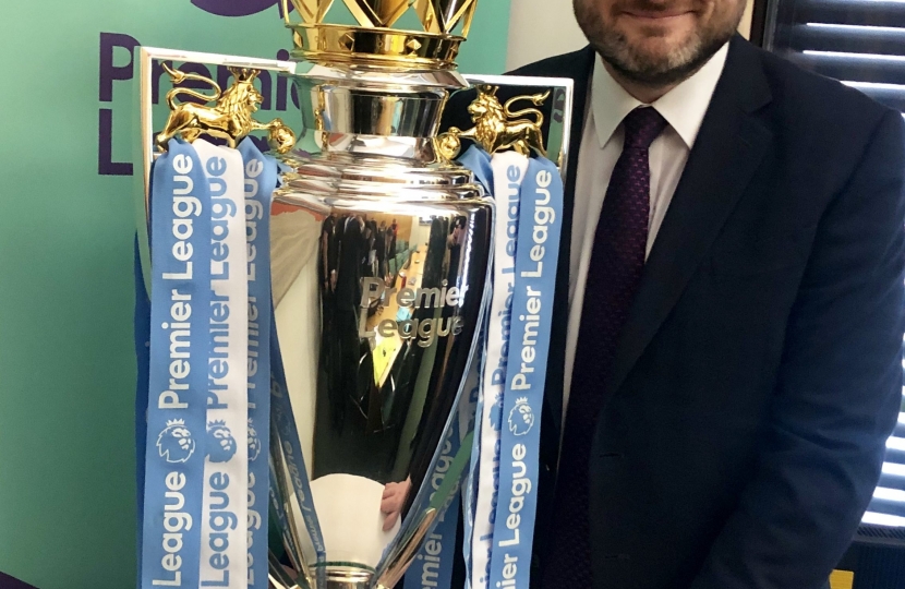 Andrew Stephenson MP with the Premier League trophy