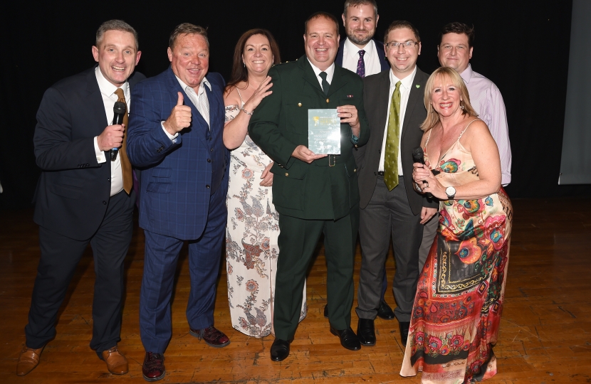 Andrew Stephenson MP receiving Lancashire Hero Award