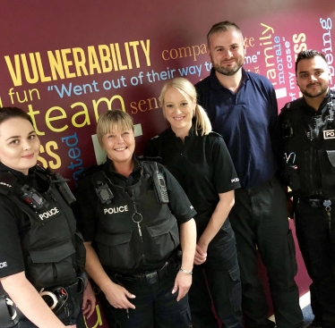 Andrew Stephenson MP with local police officers